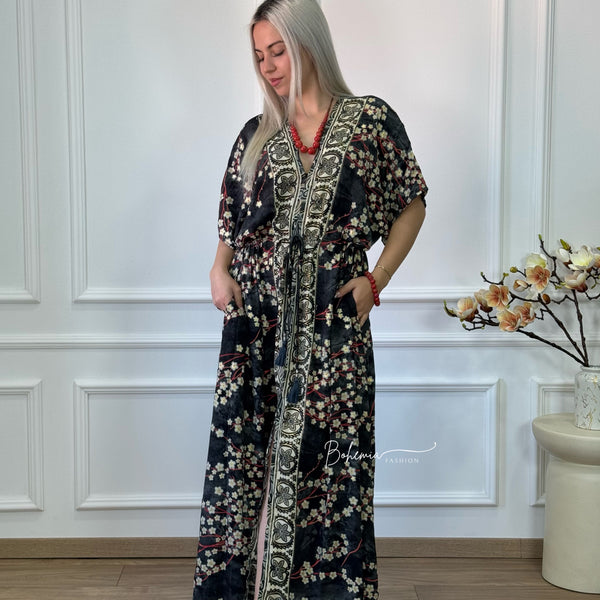 Rochie maxi strânsă în talie